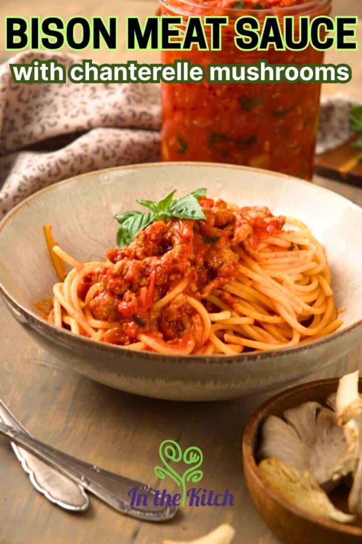 Spaghetti and bison meat sauce with text overlay that says 'Bison Meat Sauce with chanterelle mushrooms'.
