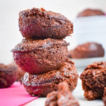 Mini brownie bites stacked on top of each other.