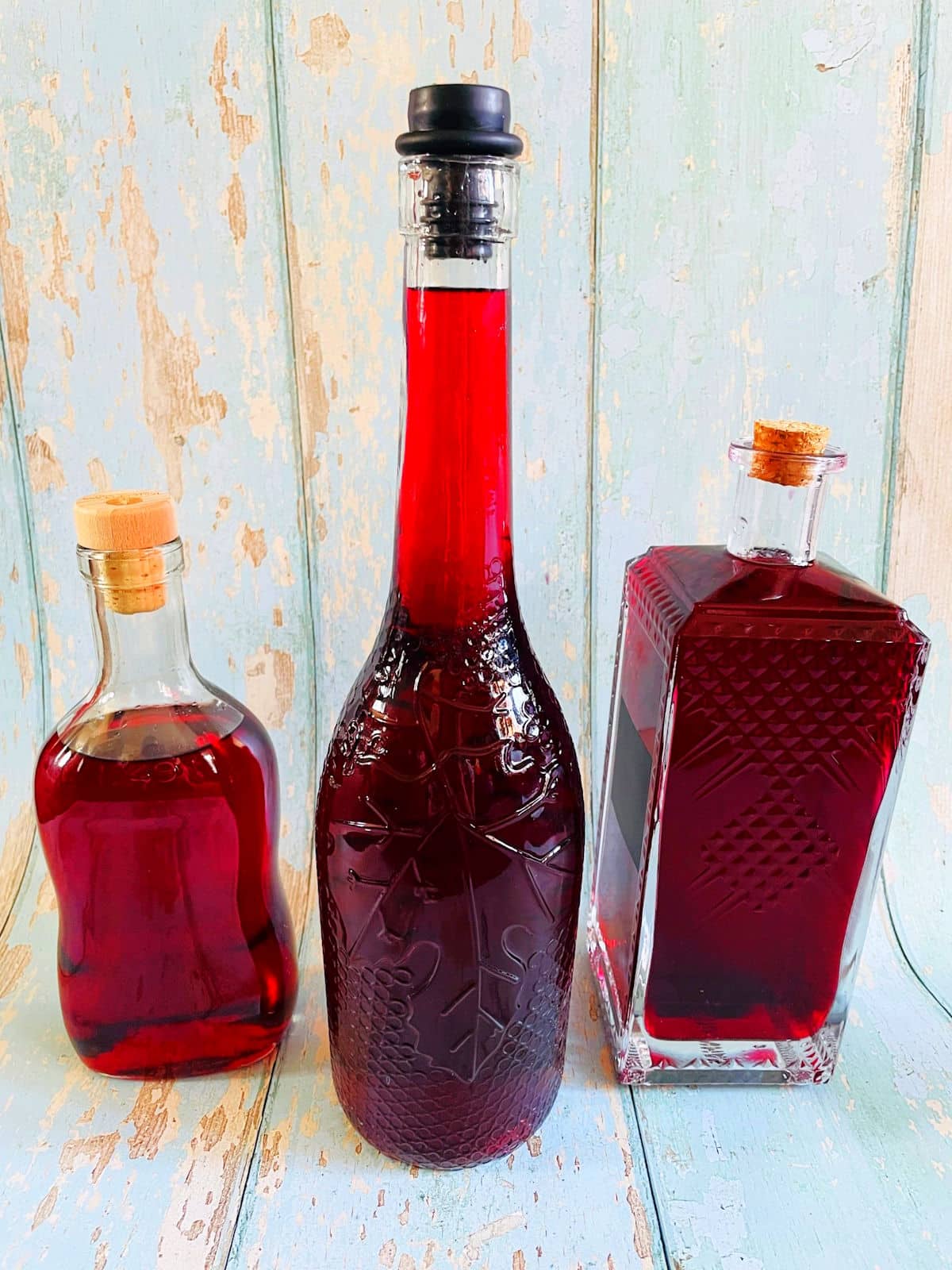 Chokecherry liqueur in bottles with corks.