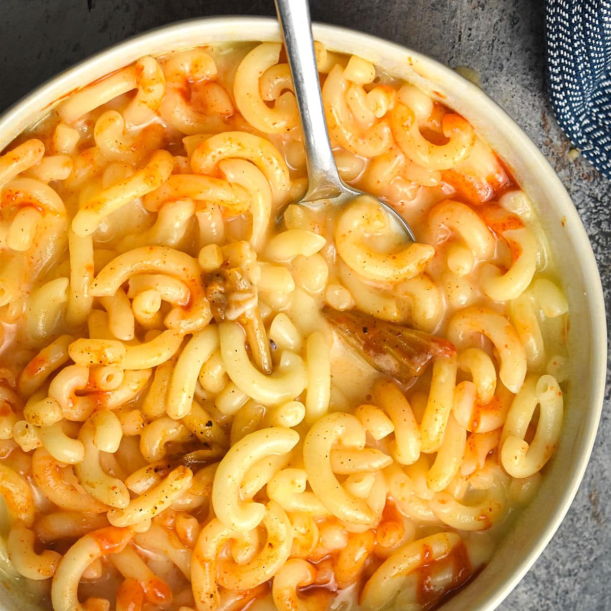 Kimchi mac and cheese in a bowl.