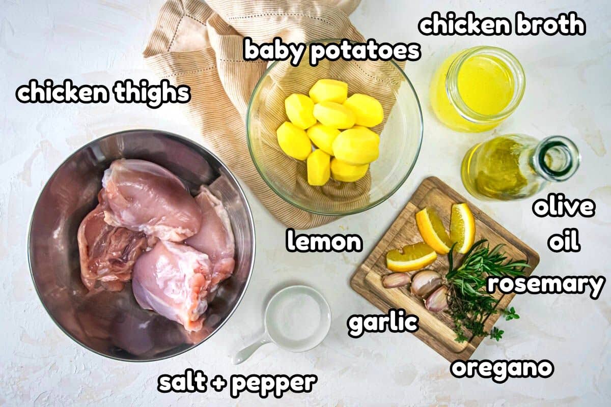 Greek lemon chicken thighs meal ingredients prepped and labeled.