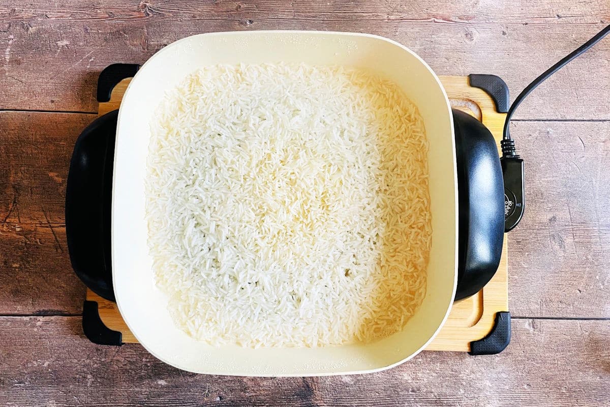 Cooked white rice in electric skillet.