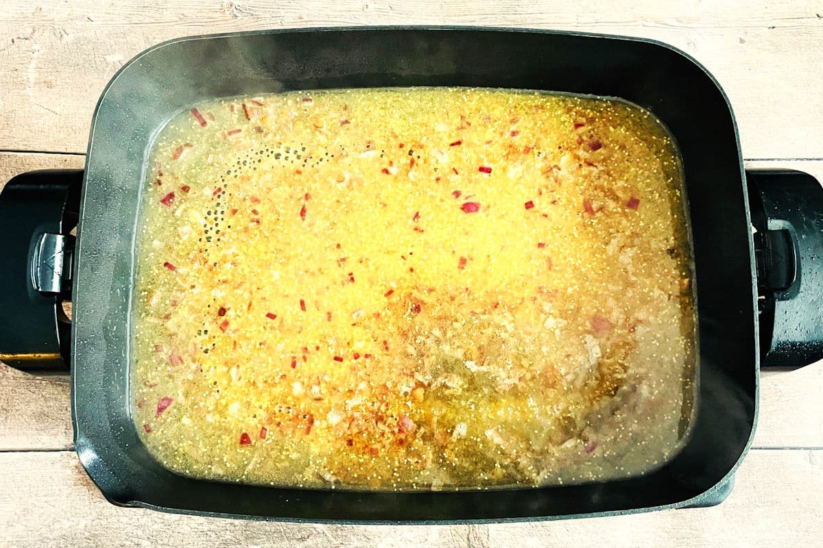 Mustard white wine sauce in electric skillet.