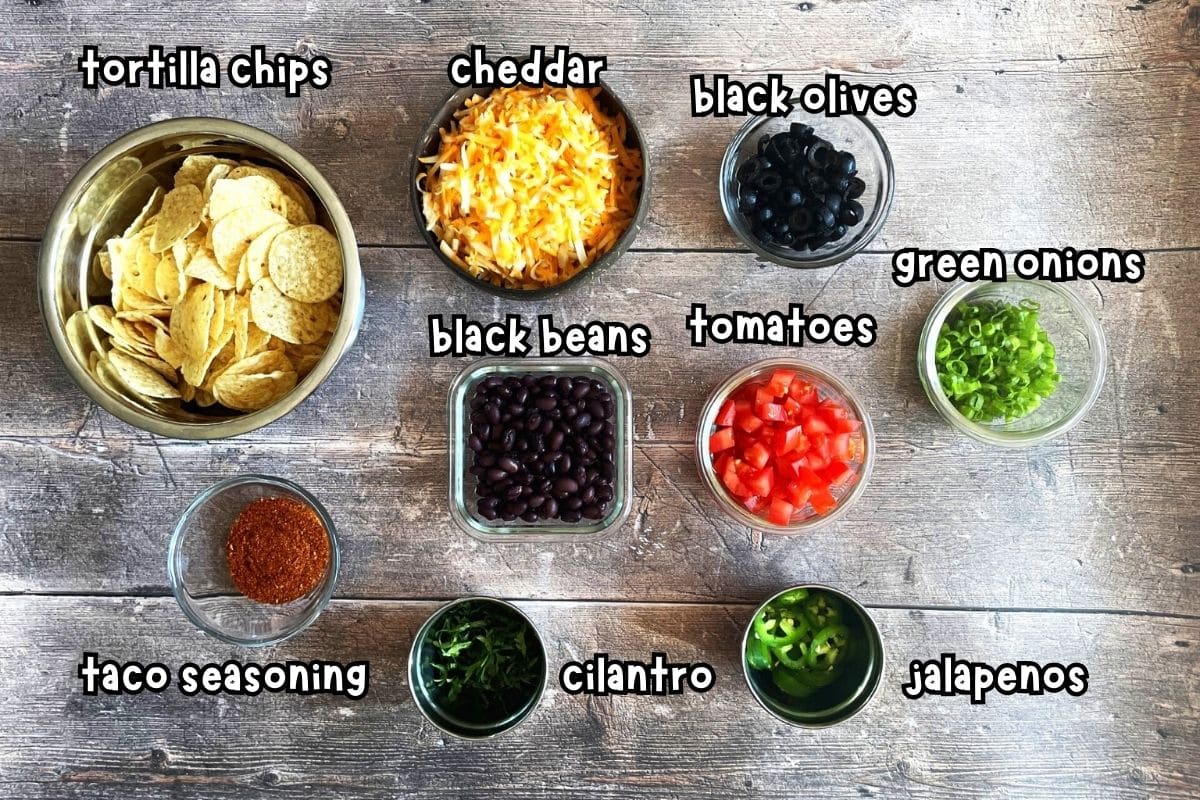 Electric skillet nachos ingredients prepped and labeled.