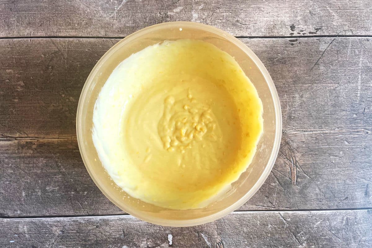 Lemon and sweetened condensed milk mixture in bowl.