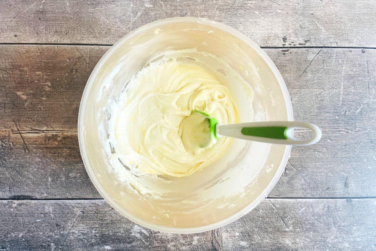 Lemon butter frosting in bowl.