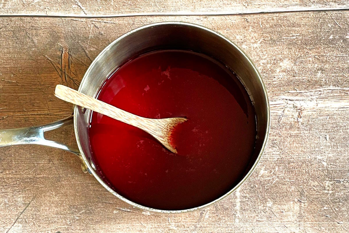 Grenadine syrup ingredients in saucepan.
