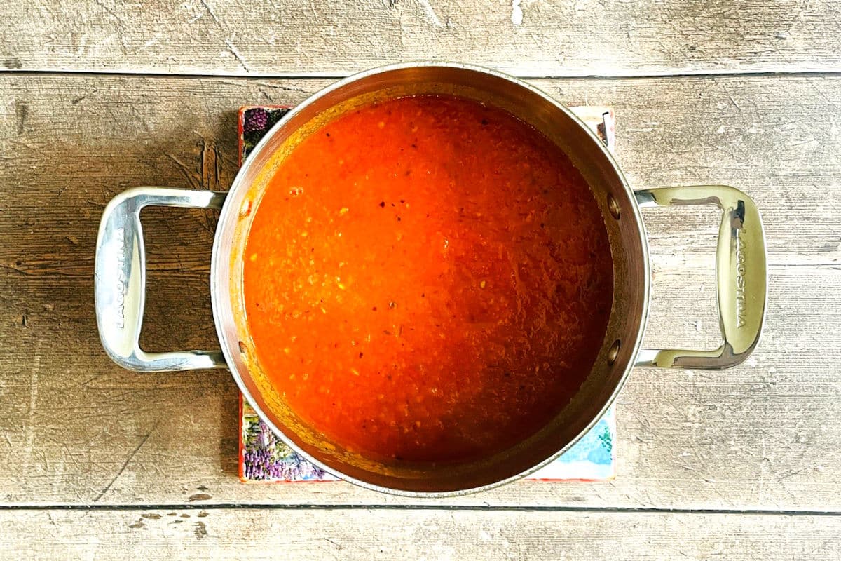 Roasted tomato garlic soup in pot.