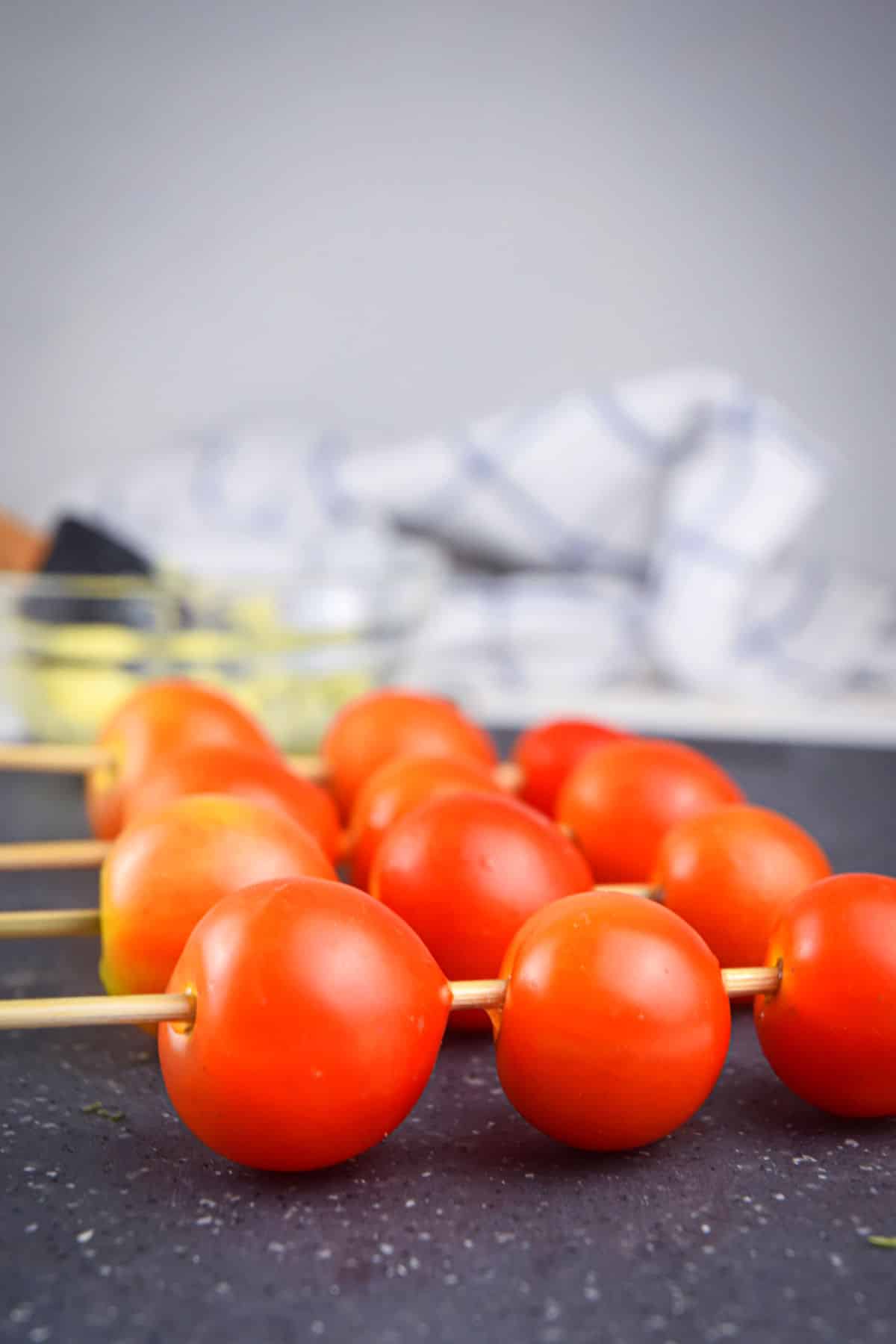 Cherry tomatoes on skewers.