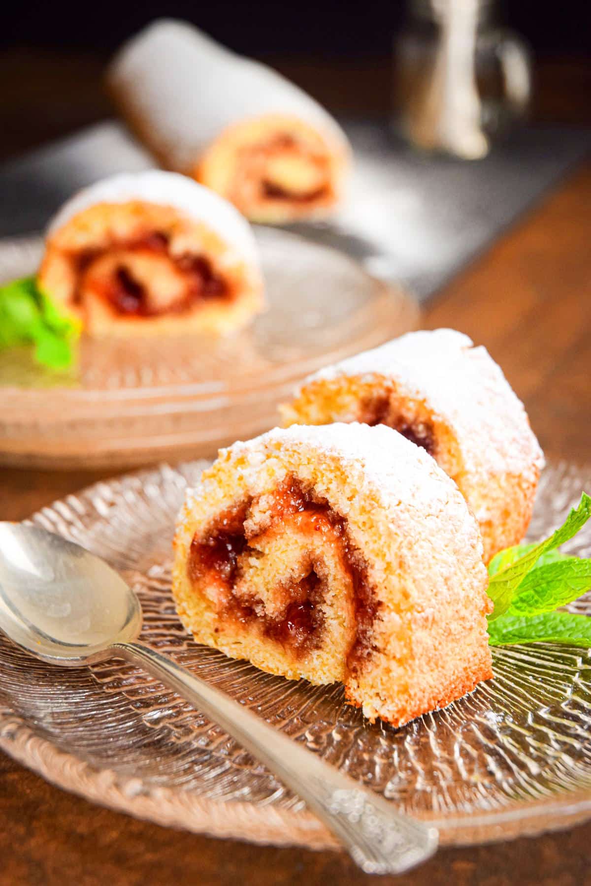 Jelly roll slices dusted with powdered sugar.