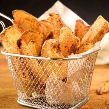 Cajun French fries in basket.