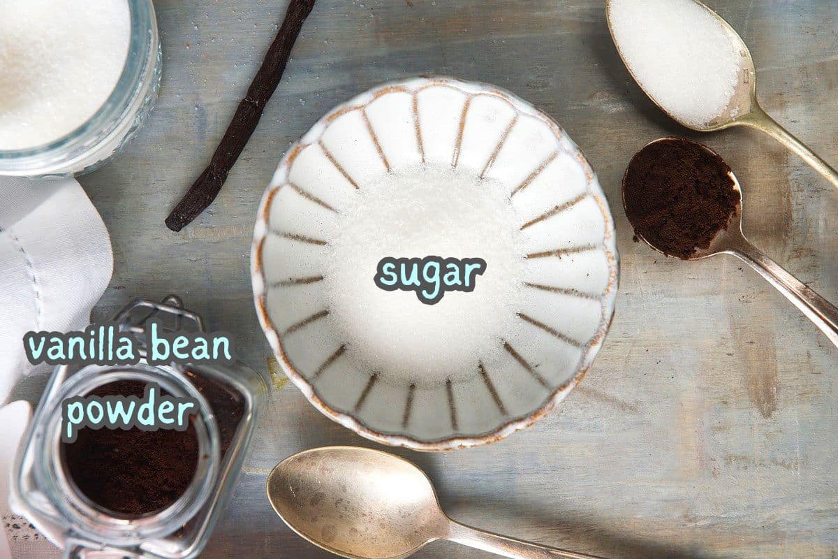 Sugar and vanilla powder in bowl and jar and labeled.