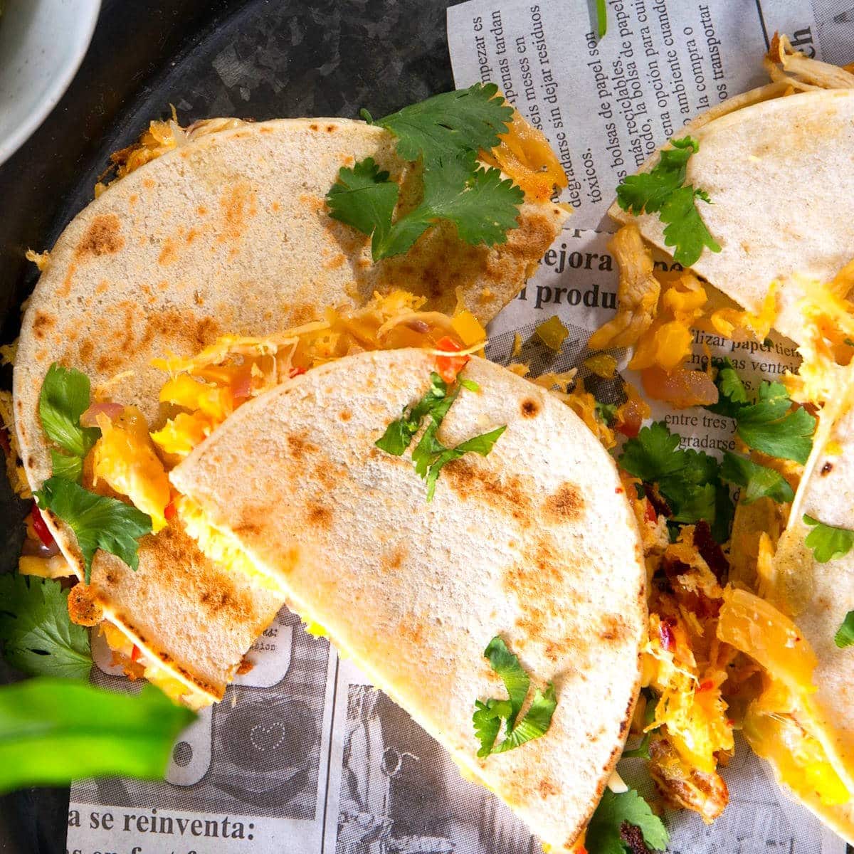 Kimchi quesadillas on serving tray.