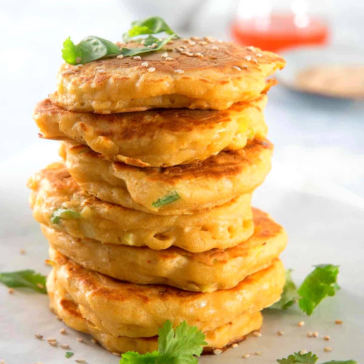 Kimchi pancakes stacked on top of each other.