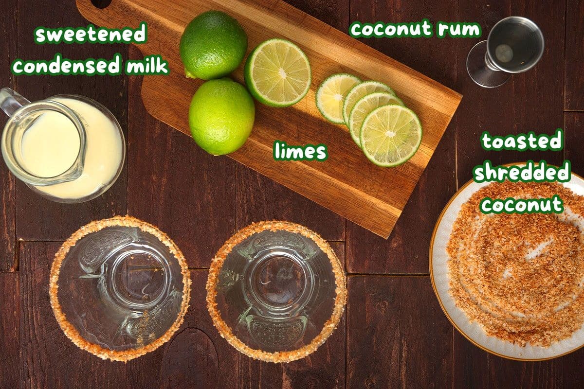 Lime cremosa drink ingredients on wooden background.