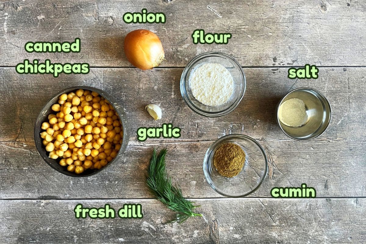 Mini falafel bite ingredients labeled on wooden background.