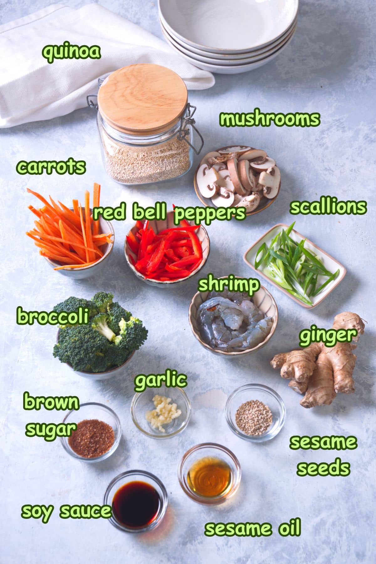 Quinoa stir fry ingredients prepped and labeled.