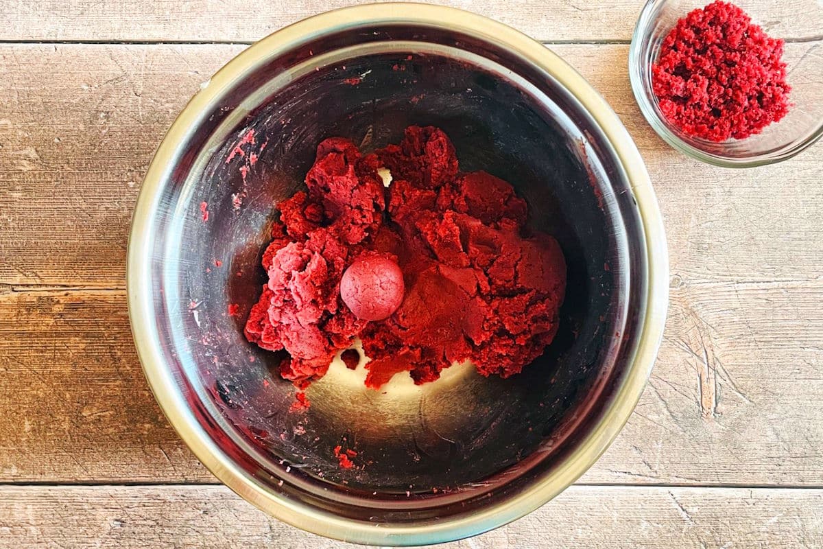 Red velvet cake pop mixture in bowl.