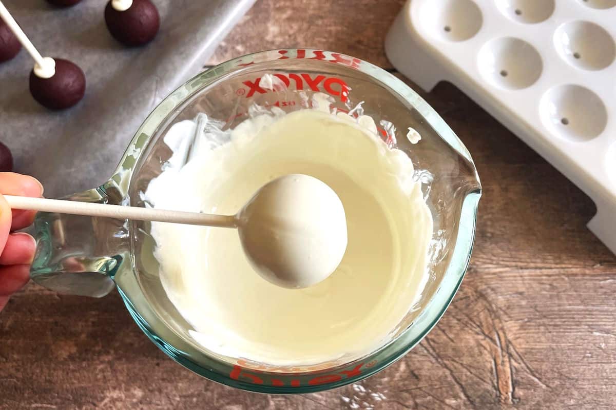 Cake pop dipped in white coating.