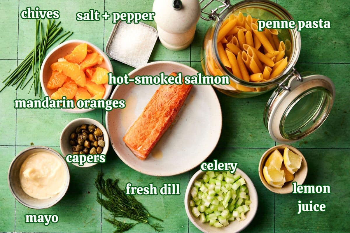Smoked salmon pasta salad ingredients prepped and labeled.