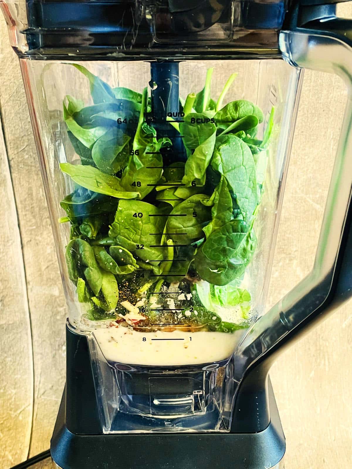 Spinach egg bites mixture in blender.