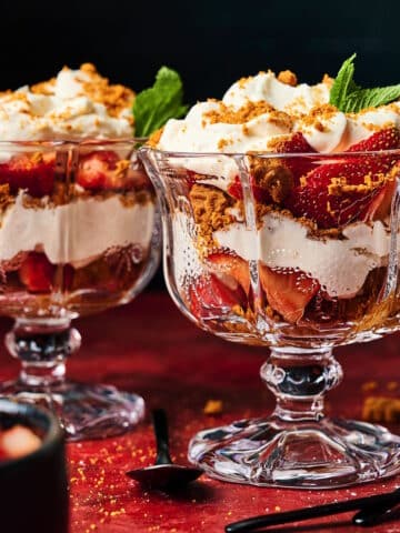 Strawberry parfait in stemmed glasses.