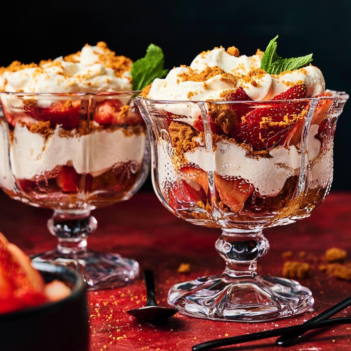 Strawberry parfait in stemmed glasses.